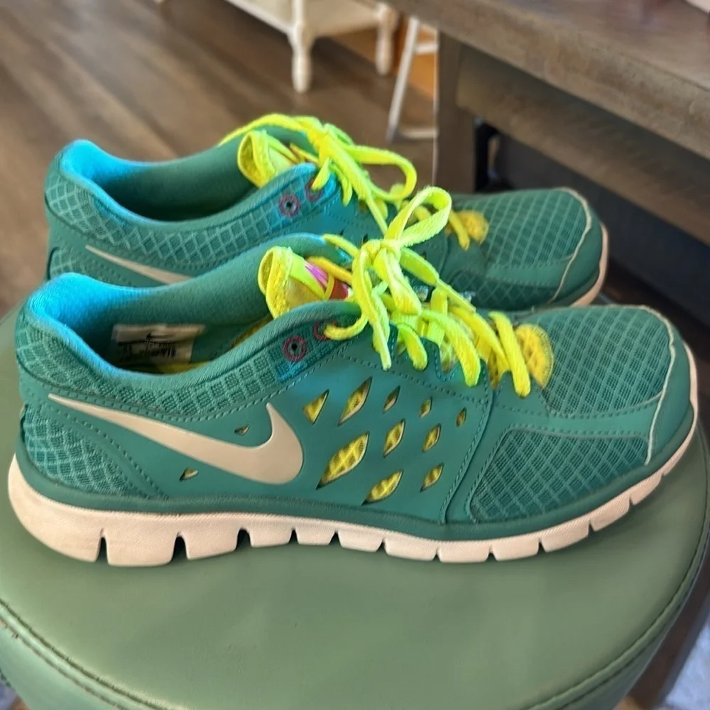 Nike running shoes, aqua blue, yellow, white size 9.5